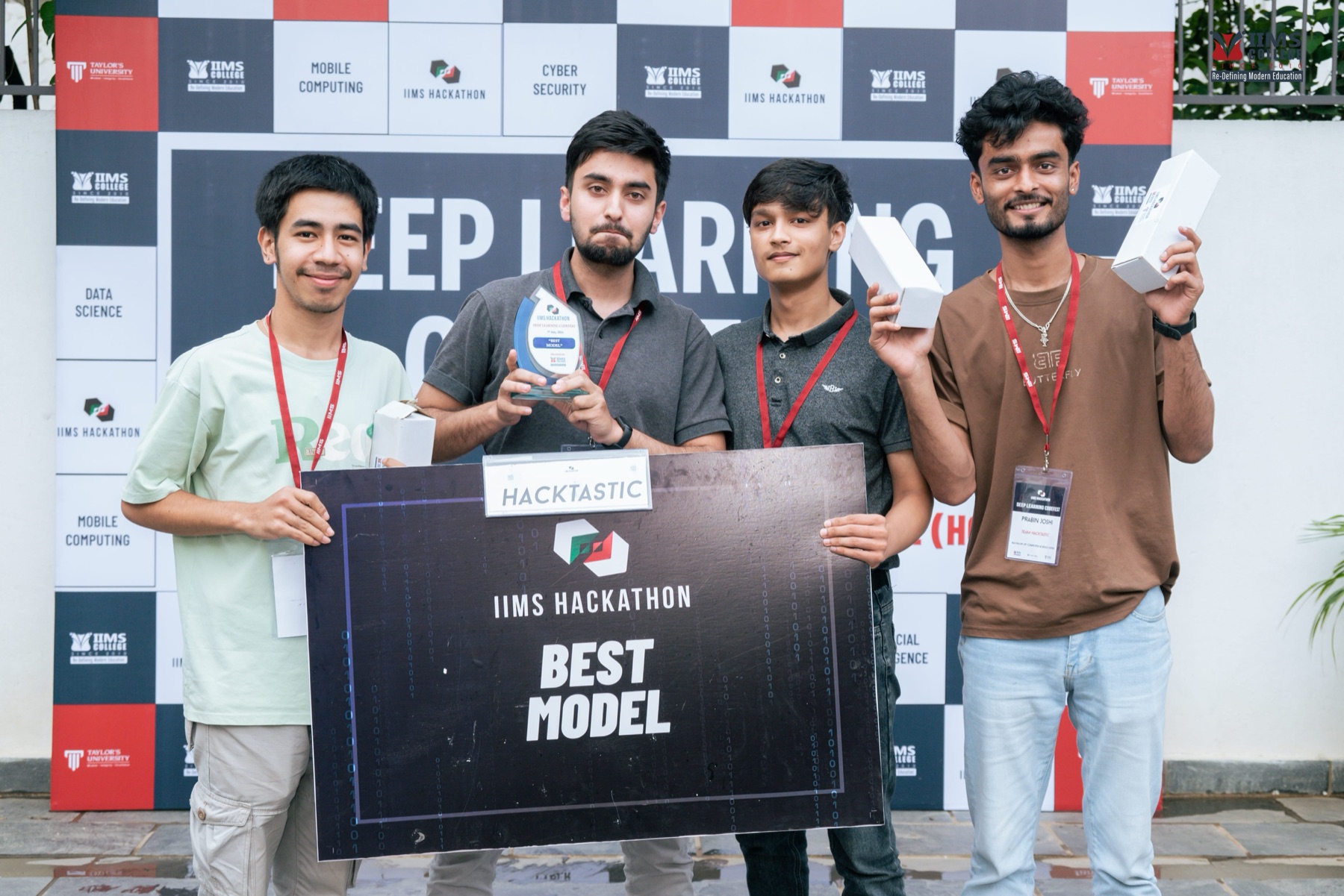 Team Hacktastic holding the Best Model award