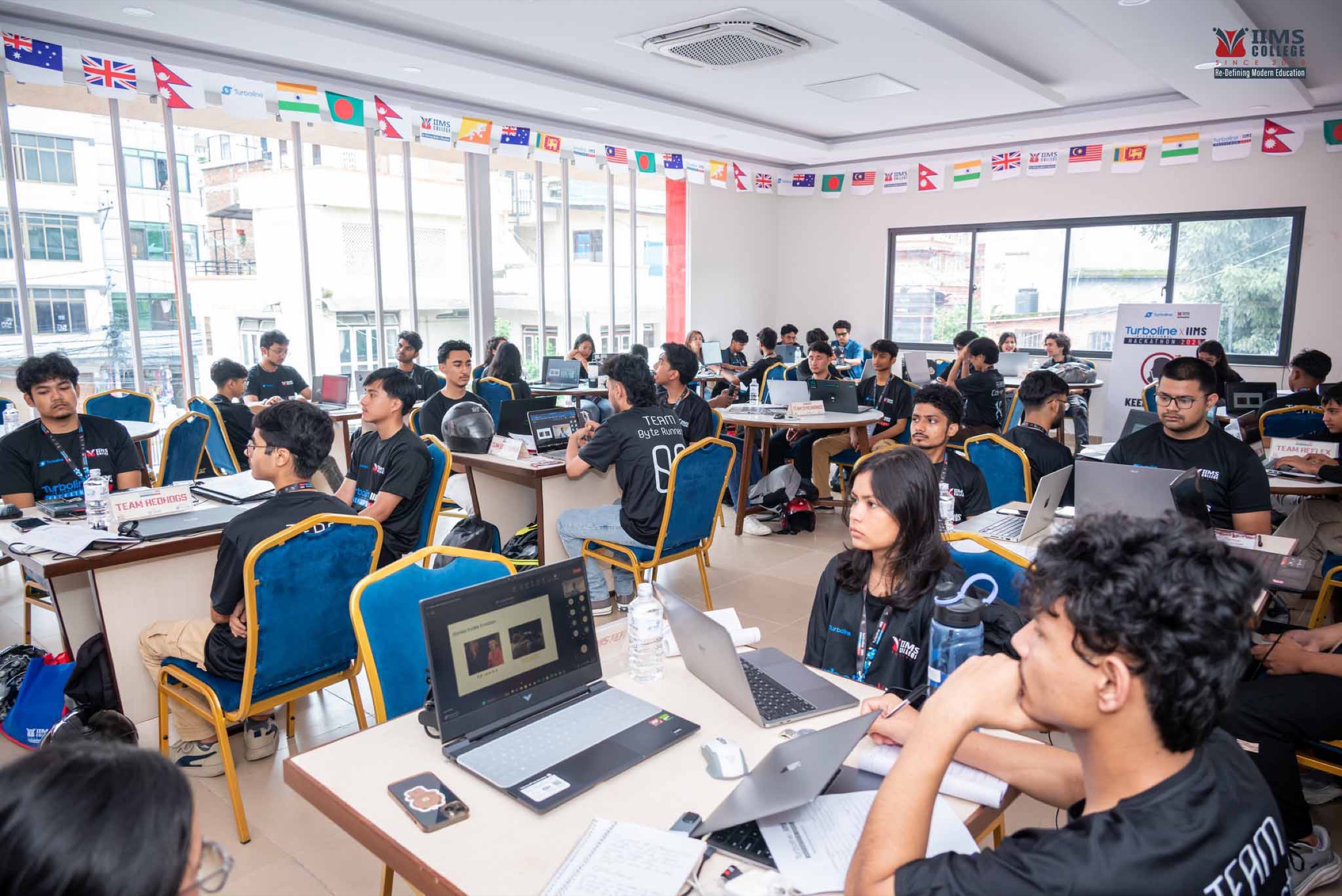 Teams working across the Turboline Hackathon event floor